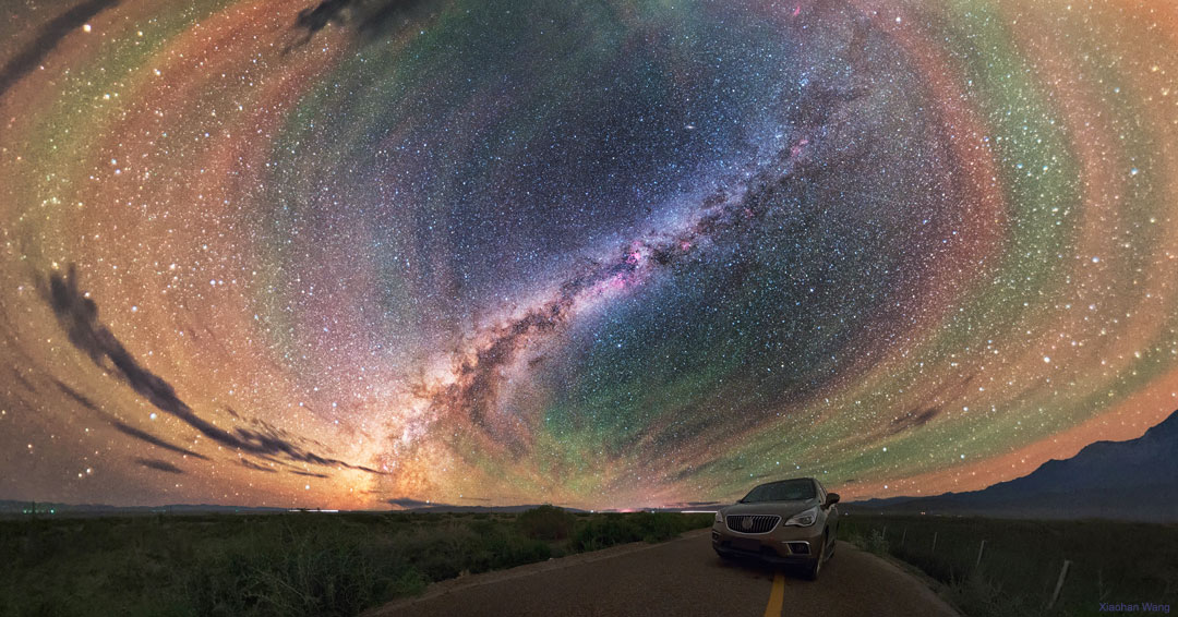 The featured image shows colorful airglow rings 
in the sky in front of a centered band of our Milky Way
Galaxy.
Please see the explanation for more detailed information.